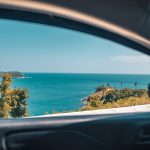 coastal view through vehicle window